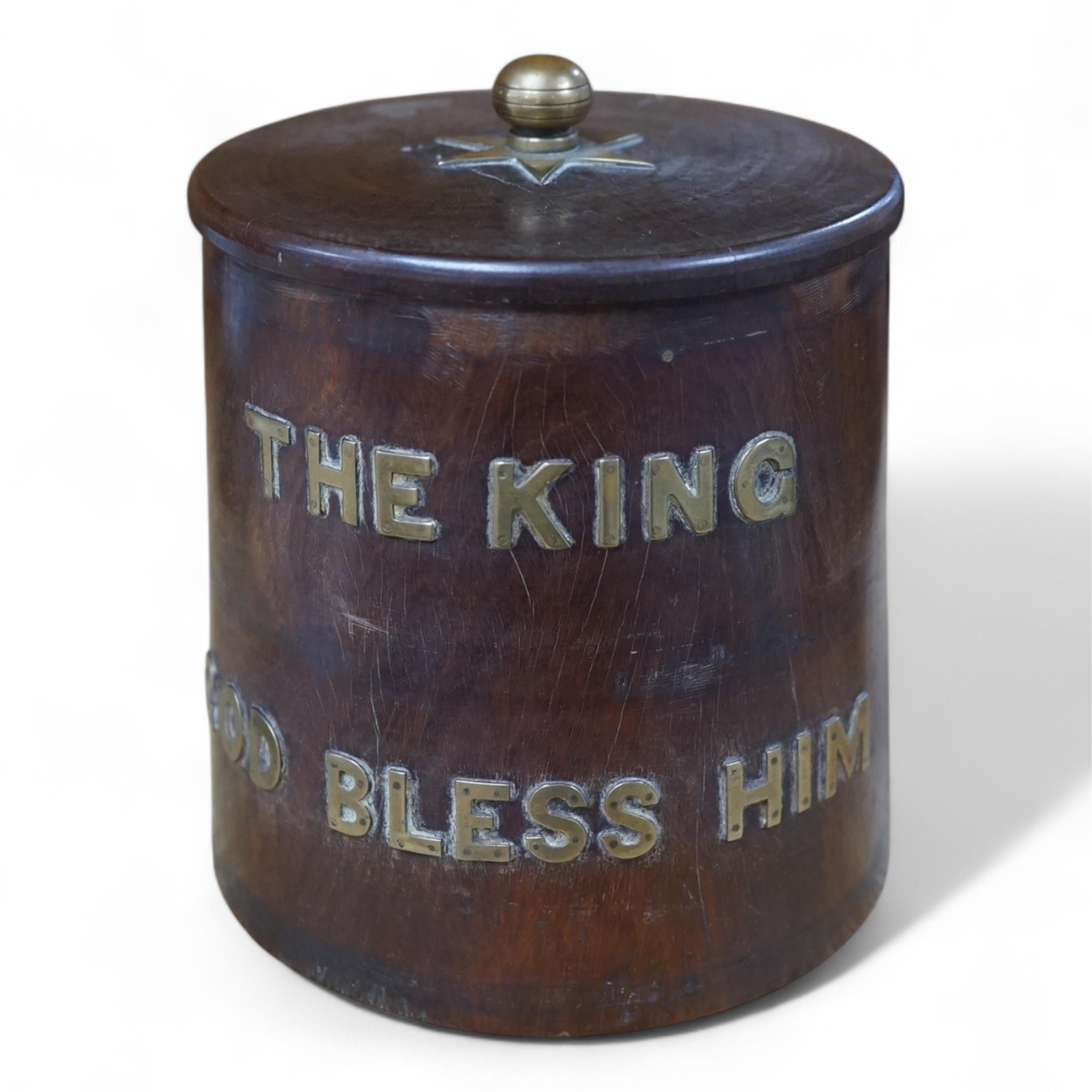 A 19th century turned lignum vitae biscuit barrel with applied brass letters; ‘The King God Bless Him’, 15cm